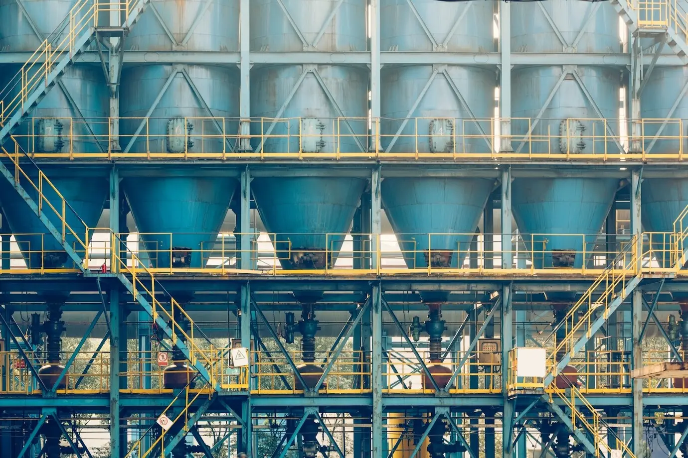 steel piping and cables inside a plant